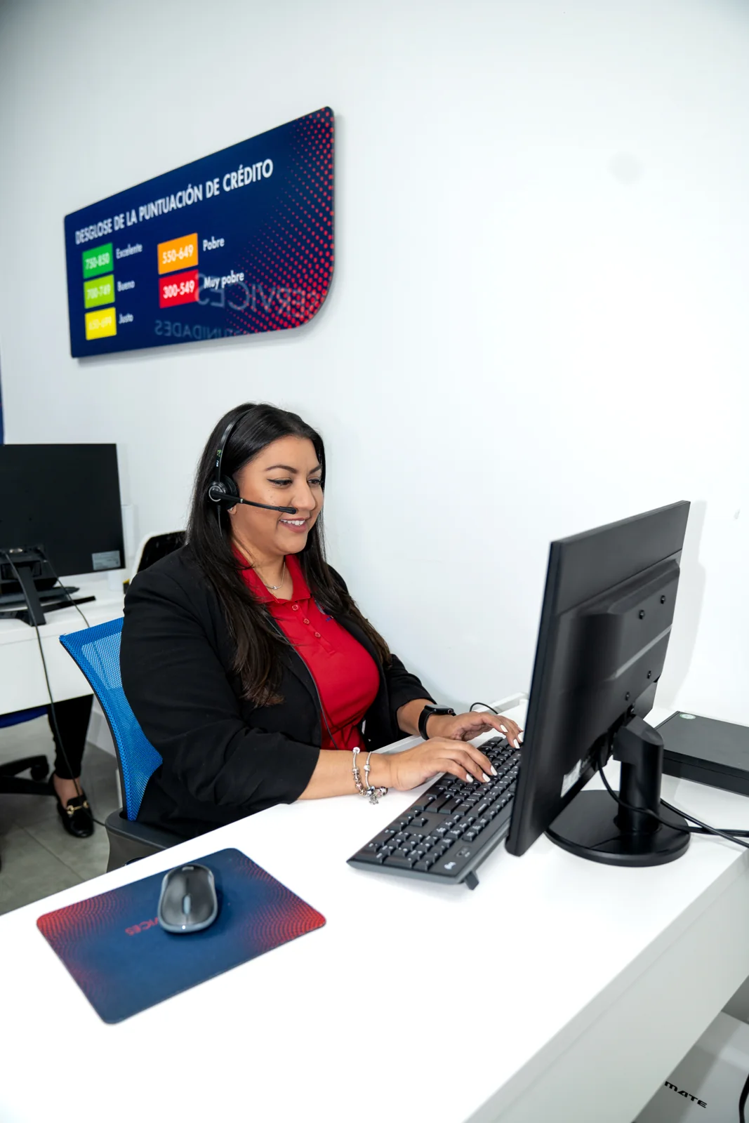 A specialist at A Plus Credit Services working through a client's report